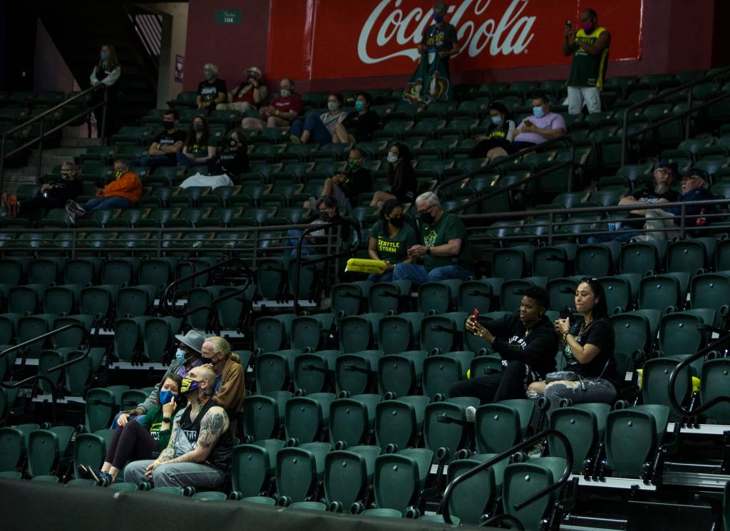 Fans sit socially distanced and masked in Angel of the Winds Arena for the Seattle Storm and Las Vegas Aces game on May 15, 2021, in Everett. 2,000 fans were allowed into the arena for the game. (Olivia Vanni / The Herald)