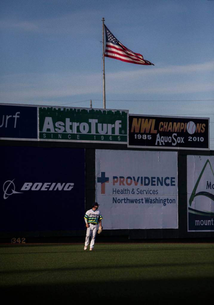 AquaSoxs Connor Hoover stands in the outfield during the game against the Dust Devils on Sunday, May 16, 2021 in Everett, Wash.