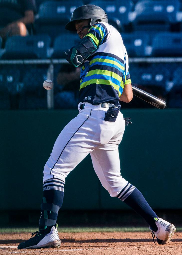 AquaSoxs Julio Rodriguez is hit with a pitch during the game against the Dust Devils on Sunday, May 16, 2021 in Everett, Wash.