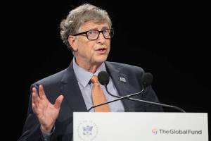 FILE - In this Thursday, Oct. 10, 2019, file photo, Philanthropist and Co-Chairman of the Bill & Melinda Gates Foundation Bill Gates gestures as he speaks to the audience during the Global Fund to Fight AIDS event at the Lyon's congress hall, central France. Despite damaging allegations suggesting Bill Gates pursued women who worked for him, don't expect changes to his roles at the two iconic institutions he co-founded, Microsoft and his namesake philanthropic foundation, raising accountability concerns from critics. (Ludovic Marin/Pool Photo via AP, File)