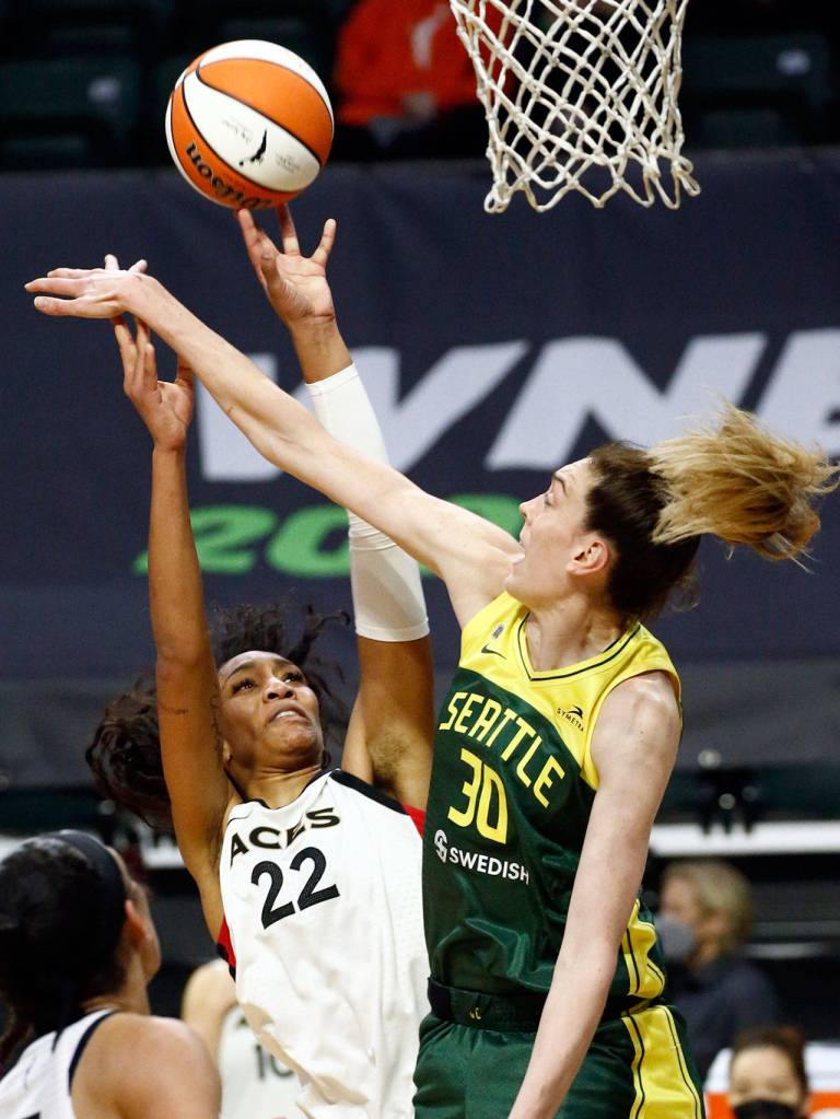Las Vegas Aja Wilson attempts shot against Seattles Breanna Stewart Tuesday night at the Angel of the Winds Arena in Everett on May 18, 2021. (Kevin Clark / The Herald)