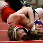 Stanwoods Tyler Rhue (left) wrestles Lake Stevens Aiden Eberlein during a match on May 20, 2021, at Stanwood High School. Lake Stevens won 48-33. (Kevin Clark / The Herald)