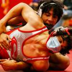Lake Stevens' Jackson Balmer wrestles Stanwood's Preston Ing Thursday night at Stanwood High in Stanwood on May 20, 2021. Lake Stevens won the match against Stanwood 48-33.  (Kevin Clark / The Herald)