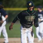 Marysville Getchell's Malakhi Knight runs to third base for a steal during the game against Arlington on Friday, May 7, 2021 in Arlington, Wash. (Olivia Vanni / The Herald)