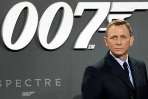 FILE - In this Oct. 28, 2015, file photo, actor Daniel Craig poses for the media as he arrives for the German premiere of the James Bond movie 'Spectre' in Berlin, Germany.   Amazon, on Wednesday, May 26, 2021,  is buying MGM, the movie and TV studio behind James Bond, “Legally Blonde” and “Shark Tank,” with the hopes of filling its video streaming service with more stuff to watch.  (AP Photo/Michael Sohn, File)