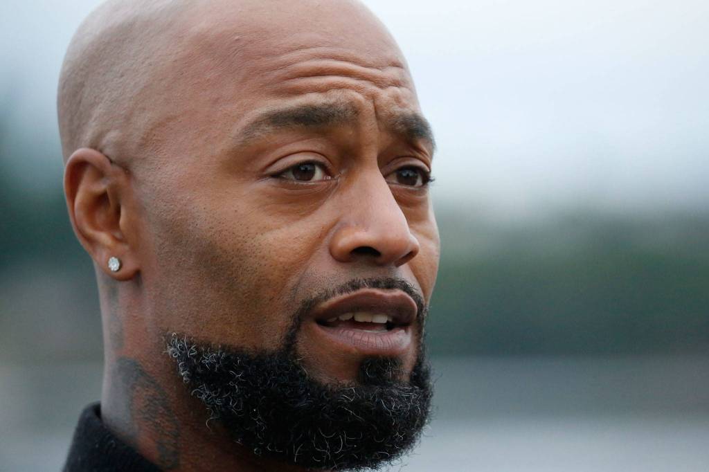 Chris Anderson of Artists In Activism addresses a gathering on the one-year anniversary of the death of George Floyd at Lundeen Park in Lake Stevens on Tuesday. (Kevin Clark / The Herald)