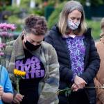 A moment of silence is observed by those gathered in Lundeen Park in Lake Stevens to mark the one-year anniversary of the death of George Floyd. Taken May 25, 2021. (Kevin Clark / The Herald)