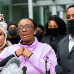 Monet Carter-Mixon (center), the sister of Manuel Ellis, speaks at a press conference June 4, 2020, as Ellis mother, Marcia Carter-Patterson (left), and brother Matthew Ellis (right) look on. (Ellen M. Banner/The Seattle Times via AP, file)