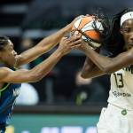 Minnesota Lynxs Crystal Dangerfield tries to steal the ball from Seattle Storms Ezi Magbegor during the game on Friday, May 28, 2021 in Everett, Wash. (Olivia Vanni / The Herald)
