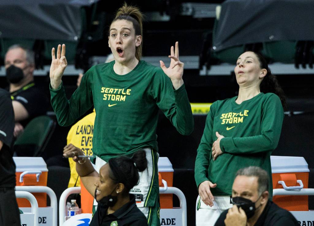 Seattle Storms Breanna Stewart and Sue Bird react to a shot block by Ezi Magbegor during the game against Minnesota on Friday, May 28, 2021 in Everett, Wash. (Olivia Vanni / The Herald)