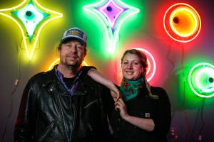Tim Leonard, owner of the Machine Shop in Langley, has spent the pandemic making neon art. He, along with his daughter Sage Leonard, is setting up for an upcoming exhibit in April featuring about 50 pieces. (Kevin Clark / The Herald)