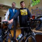 Jon Boyce (left) and his grandson, Deven Boyce, 14, in their home in Mukilteo before leaving on a two-month bike trip across the country. (Olivia Vanni / The Herald)