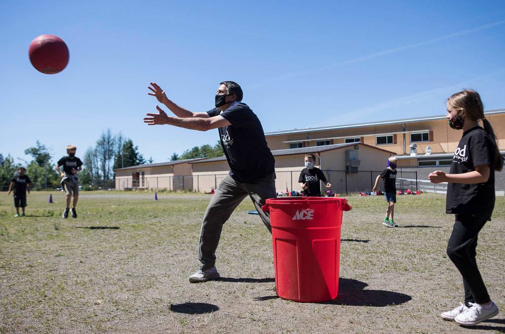 Jeff Thoreson plays kickball with his class. (Olivia Vanni / The Herald)