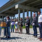 With other officials behind her, u.S. Rep. Suzan DelBene (WA-01) speaks at a press conference underneath the US 2 trestle on Wednesday, June 2, 2021 in Lake Stevens, Washington. The elected officials gathered  to make their case for how an injection of federal funds into the nation’s transportation infrastructure could lead to less congested and safer commutes for Snohomish County residents. (Andy Bronson / The Herald)