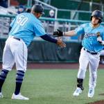 The AquaSoxs Kaden Polcovich rounds third base after hitting a home run during a game against the Hops on Thursday evening at Funko Field in Everett. (Kevin Clark / The Herald)