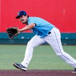 The AquaSoxs Austin Shenton fields a grounder during a game against the Hops on Thursday evening at Funko Field in Everett. (Kevin Clark / The Herald)