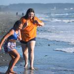 Photo by Emily Gilbert/Whidbey News-Times
Caraleigh Hernandez, 10, left, and her sister Denelle, 14, play on the beach at Deception Pass State Park.