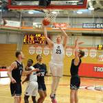 Everett Community College mens basketball player Devin Smith (23) goes up for a layup during the Trojans 70-64 victory over Bellevue, which clinched the NWAC North Division title for Everett, last Saturday at the Walt Price Student Fitness Center in Everett. (Daniel Acosta / Everett Community College)