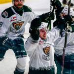 Silvertips' Ethan Regnier (bottom) celebrates a goal against the Spokane Chiefs during the final home game Friday night at Angel of the Winds Arena in Everett on May 7, 2021.  (Kevin Clark / The Herald)