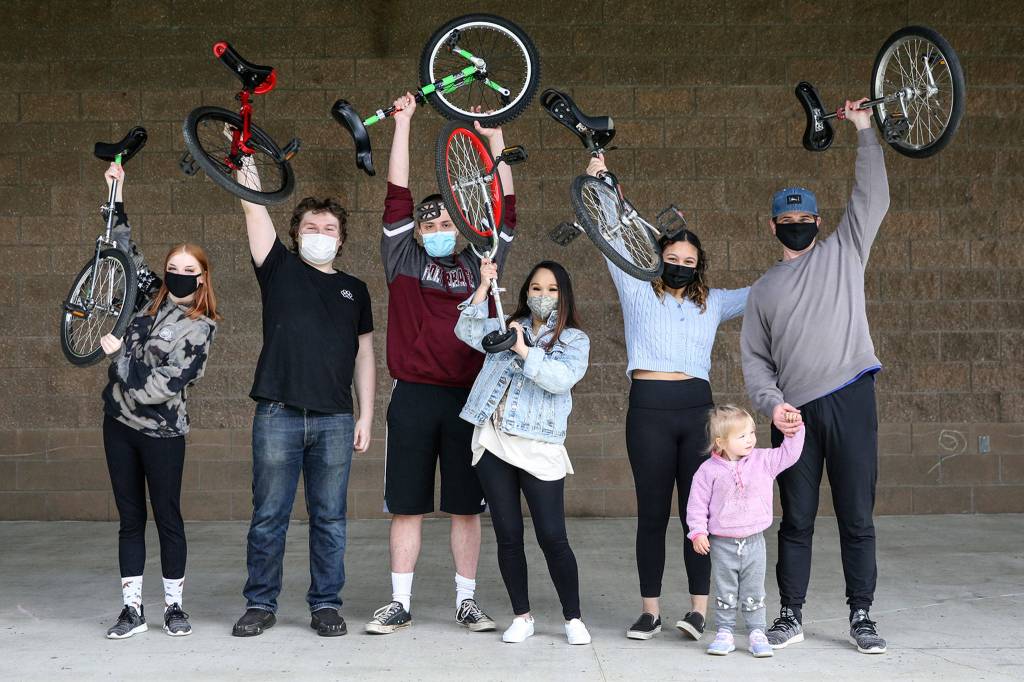 From left, former Cathcart Elementary School students Patsy May, Kelton Parkinson, Julian West, Rebecca Loran, Evie Feltner and Nate Feltner with Emma Feltner, his daughter. (Kevin Clark / The Herald)