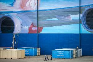 Boeing workers walk outside of Boeing's Everett assembly plant on Tuesday, April 21, 2020 in Everett, Wa. (Olivia Vanni / The Herald)