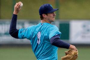 Brandon Williamson pitches during the first game of a double header against the Hops on Sunday, June 6, 2021 in Everett, Wash. (Olivia Vanni / The Herald)