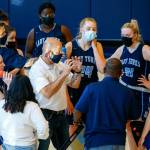 Third-year Sultan coach Todd Weideman (center) has guided the Turks to their highest win total in more than a decade. (Kevin Clark / The Herald)