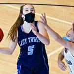 Sultan's Grace Trichler looks to score with Eastside Prep's Katelyn Miller defending Thursday afternoon at Eastside Prep in Kirkland on June 17, 2021.  (Kevin Clark / The Herald)