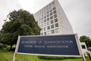 FILE - In this June 19, 2015 file photo, Department of Transportation Federal Aviation Administration building is seen in Washington.  The Federal Aviation Administration said Wednesday, June 2, 2021 that Ali Bahrami, the head of FAA's aviation safety office, will step down at the end of June. Bahrami was among FAA officials who were criticized by lawmakers and relatives of passengers on Boeing Max jets that crashed.  (AP Photo/Andrew Harnik, File)