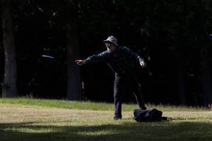 Don Helphrey putts on the first hole at Kayak Point Disc Golf Resort on Friday, June 18, 2021 in Stanwood, Wa. (Olivia Vanni / The Herald)