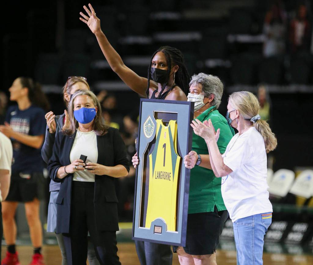 The Seattle Storm ownership honors the retirement of two-time WNBA champion and two-time WNBA All-Star Crystal Langhorne after a 13-year professional career. The Storm lost to the Mystics on Tuesday at the Angel of the Winds Arena in Everett, Washington. (Andy Bronson / The Herald)