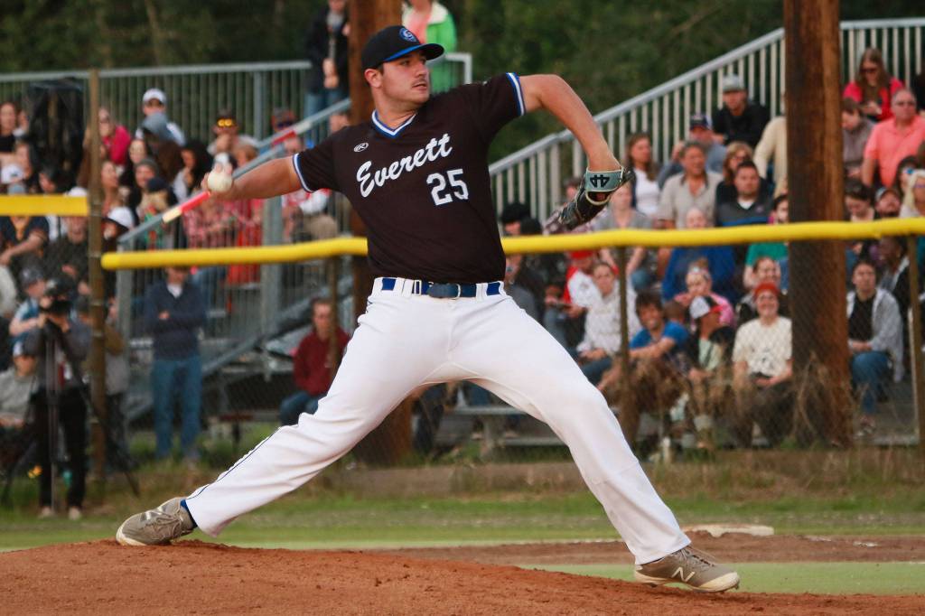 Merchants pitcher Jared Maxfield throws to a Goldpanners hitter during the 116th Midnight Sun Game on June 21 in Fairbanks, Alaska. (Photo by Justin Prax)