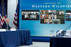 President Joe Biden, right, listens during an event in the South Court Auditorium on the White House complex in Washington, Wednesday, June 30, 2021, with cabinet officials and governors from Western states to discuss drought and wildfires. Others a the table are, from left, White House chief of staff Ron Klain, Energy Secretary Jennifer Granholm and Interior Secretary Deb Haaland. (AP Photo/Susan Walsh)