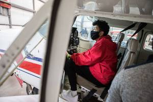 Jackson Ishida, 13, runs through a preflight safety check during a Red-Tailed Hawks Flying Club program on Saturday, June 12, 2021 in Arlington, Wa. (Olivia Vanni / The Herald)