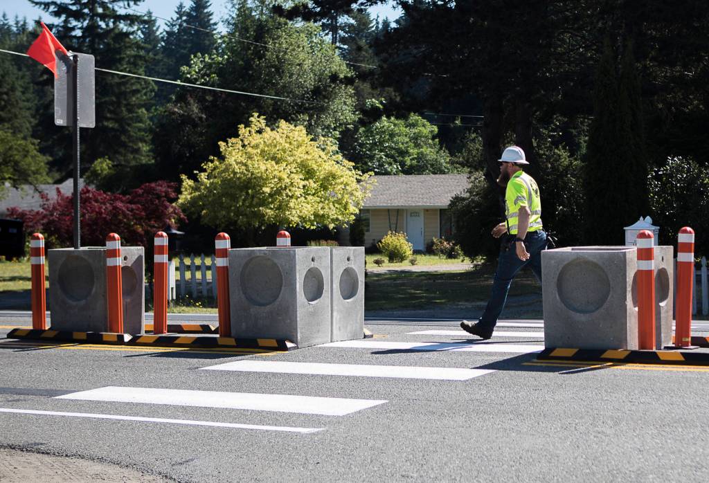 A crosswalk at the intersection of 180th Street NE and Smokey Point Boulevard was installed June 27 as part of a complete streets demonstration in Arlington. (Olivia Vanni / The Herald)
