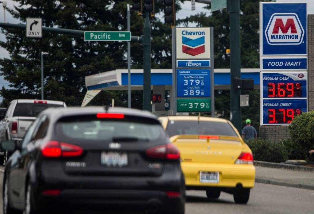Gas prices along Broadway on Thursday in Everett. (Olivia Vanni / The Herald)
