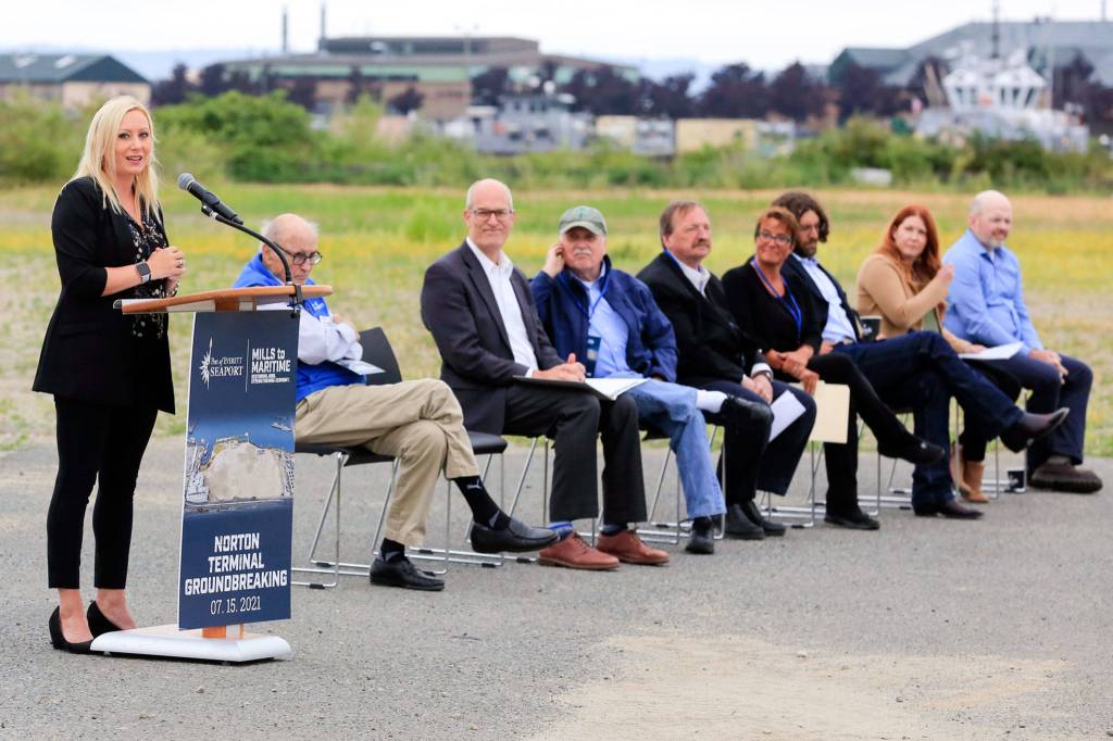 Port of Everett Executive Director Lisa Lefeber (left) addresses the gathering before the groundbreaking ceremony at the ports Norton Terminal Thursday in Everett. (Kevin Clark / The Herald)