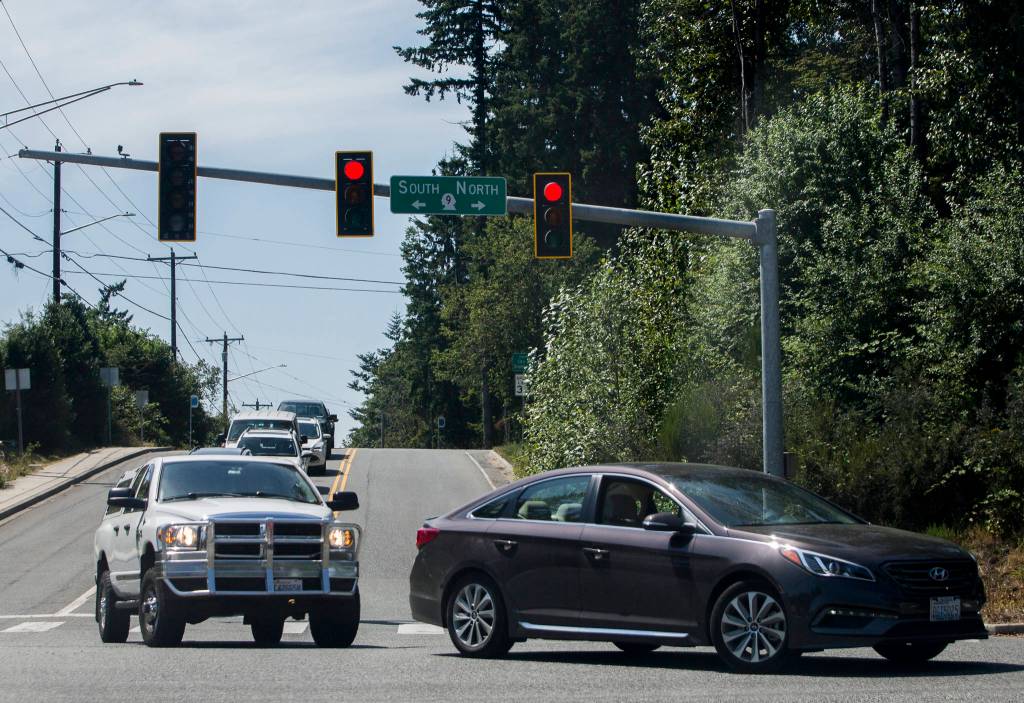 From 30th Street, drivers wait Friday in the intersection to head north on Highway 9 in Snohomish. (Olivia Vanni / The Herald)