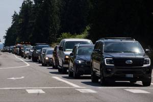 Cars headed north on Highway 9 line up south of the light at 30th Street on Friday, July 9, 2021 in Snohomish, Wa. (Olivia Vanni / The Herald)