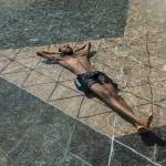 Kais Bothe relaxes in the cool in the city hall pool, as temperatures hit 37 degrees Celsius (98.6 Fahrenheit) in Edmonton, Alberta, on June 30. (Jason Franson/The Canadian Press via AP, file)