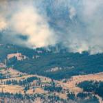 In this July 1 photo, a wildfire burns in the mountains north of Lytton, British Columbia, Canada, during record high temperatures. (Darryl Dyck/The Canadian Press via AP, File)