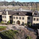 In this 2019 photo, the French-style inspired main building of the Chateau Ste. Michelle winery is seen in Woodinville. (AP Photo/Elaine Thompson, file)
