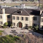 In this photo taken Thursday, Nov. 21, 2019, the French-style inspired main building of the Chateau Ste. Michelle winery is seen in Woodinville, Wash. Washington, which now boasts more than 1,000 wineries in the state, has become a force in the wine industry. Washington is the second-largest producer of premium wines in the United States, trailing only California. (AP Photo/Elaine Thompson)