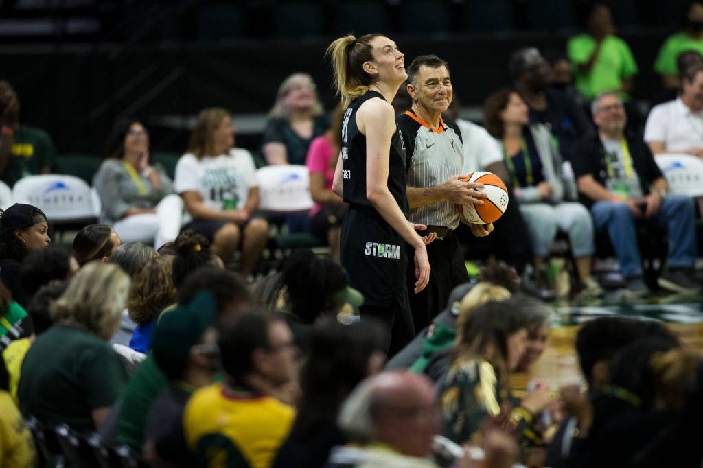 Seattle Storms Breanna Stewart laughs with a referee during the Seattle Storm game against the Phoenix Mercury on Sunday, July 11, 2021 in Everett, Wash. (Olivia Vanni / The Herald)