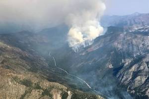 US Forest Service photo showing both Delancy and Varden Fires taken 7/11 from the aerial attack plane, looking southeast in the direction of Winthrop.   Delancy is the smaller fire shown on the lower right (north side of Hwy 20), Varden is the larger plume toward the top of the photo on the ridge (south side of Hwy 20).