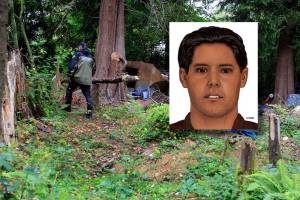 Detective Dave Bilyeu of the Snohomish County Sheriff's Office leaves the grave site of a John Doe near Mill Creek on July 20, 2021. The remains were found in September 2020, by a homeless man living in the greenbelt.  (Kevin Clark / The Herald)