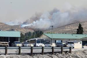 The Red Apple Fire was threatening homes, apple orchards and an electrical substation, but no structures have been lost, officials said. (Washington State Department of Transportation)