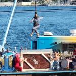 The crane truck circus includes a hair-twirling act. (Submitted photo)