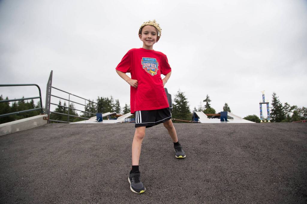 Camden Tatarian, 7, of Stanwood wears a crown signifying he went undefeated in his races at the 14th Stanwood-Camano Island Soap Box Derby. Hell be racing Saturday in Akron, Ohio. (Andy Bronson / The Herald)