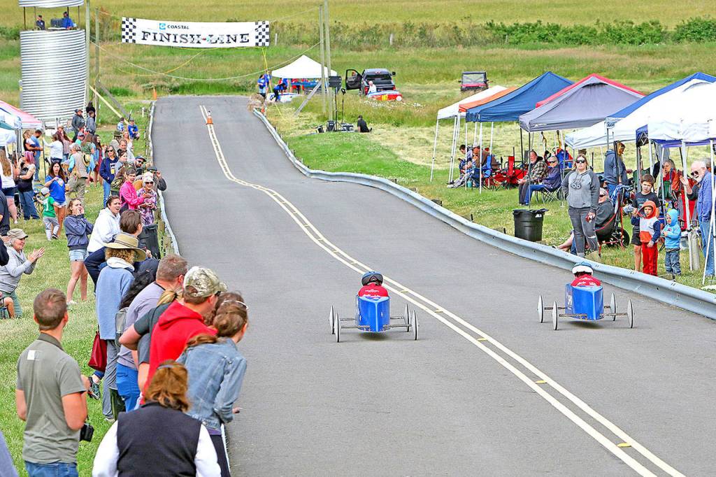 Cars race down the hill at the Stanwood-Camano Island Soap Box Derby at Arrowhead Ranch on Camano Island. (Ian Gleadle)